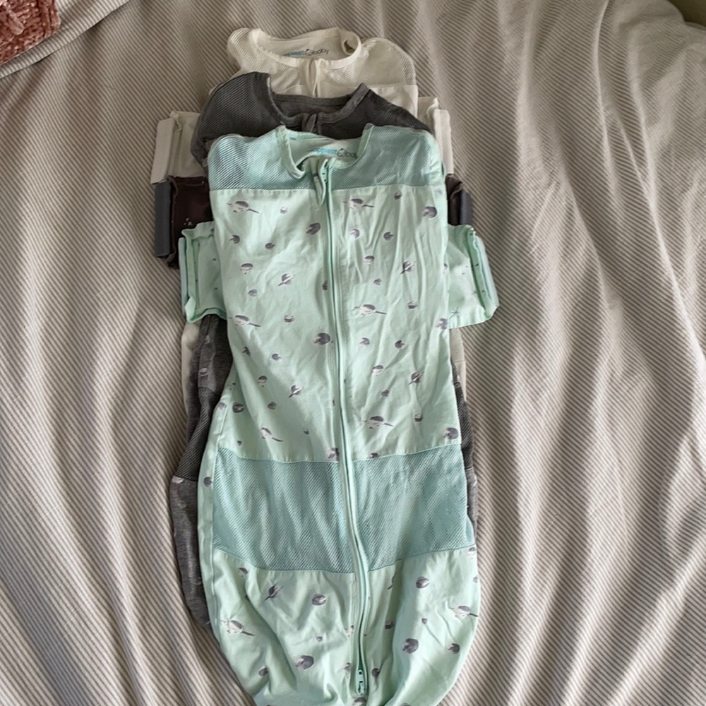 3 used snoo sleep swaddles  medium and larges